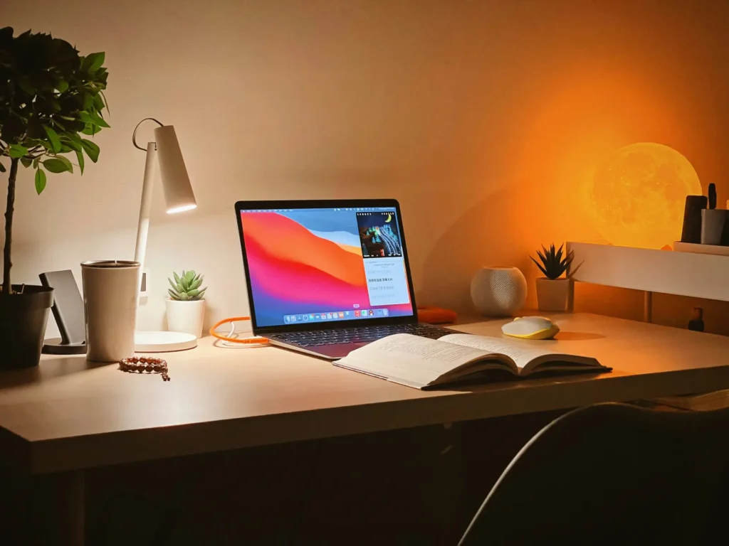Best Productivity Apps to Supercharge Your Workflow - Mac computer on cozy desk 